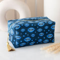 Bolsa de Maquillaje Terciopelo "Ojo que Todo lo Ve" - Azul Oscuro con Borla Dorada