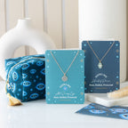 Bolsa de Maquillaje Terciopelo "Ojo que Todo lo Ve" - Azul Oscuro con Borla Dorada