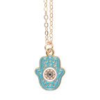Collar "Mano de Hamsa" Turquesa Dorado en Tarjeta "Visto, Guiado, Protegido"